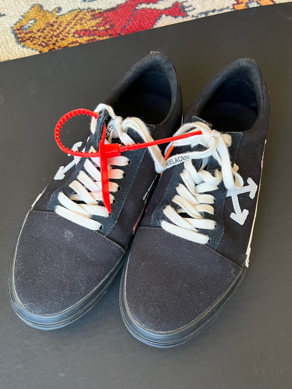 Off-White Black Canvas Low-Top Sneakers with White Arrows and Red Zip-Tie